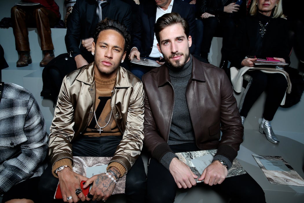 Neymar Jr., and Kevin Trapp front row at the Louis Vuitton Fall/Winter 2018 runway at Paris Fashion Week (Photo: Courtesy of LOUIS VUITTON)
