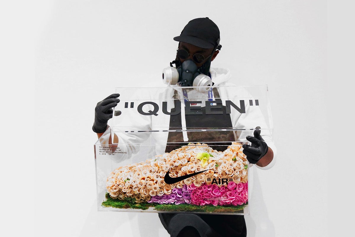 Mr Flower Fantastic himself, seen here with the piece he created of the Serena Williams and Virgil Abloh’s “QUEEN” Air Max 97 - Rosalyn Solomon for Swagger Magazine