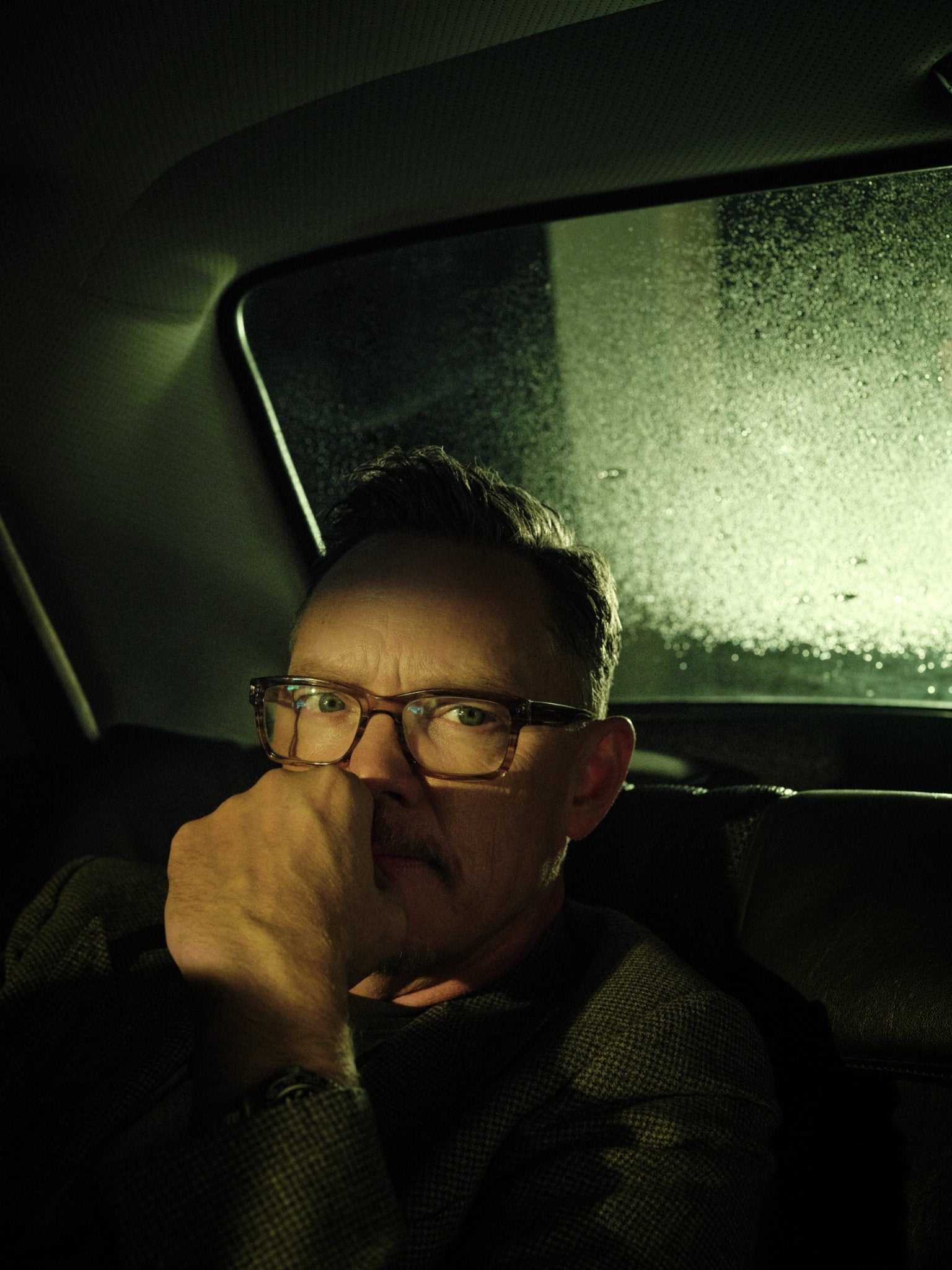 Matthew Lillard seated in a car