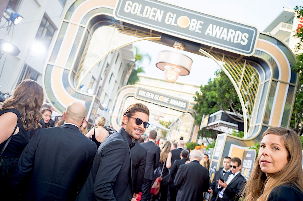 Zac-Efron-Entering-the-Golden-Globes-2018-Golden-Globes-Best-Dressed-SWAGGER-Magazine