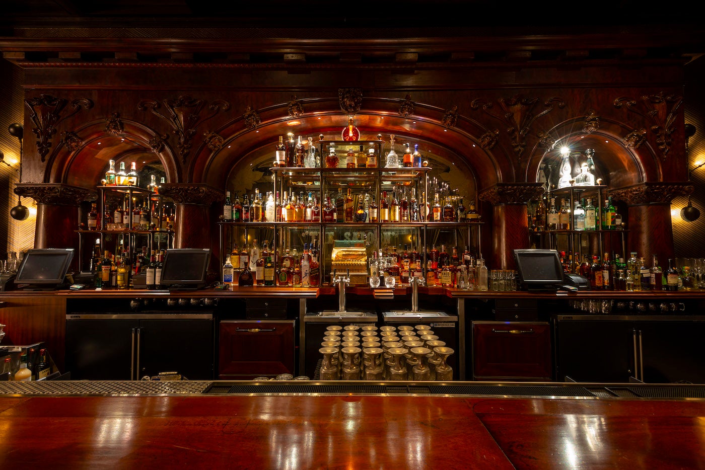 Main bar at The Barbership Cut and Cocktails speakeasy whiskey bar