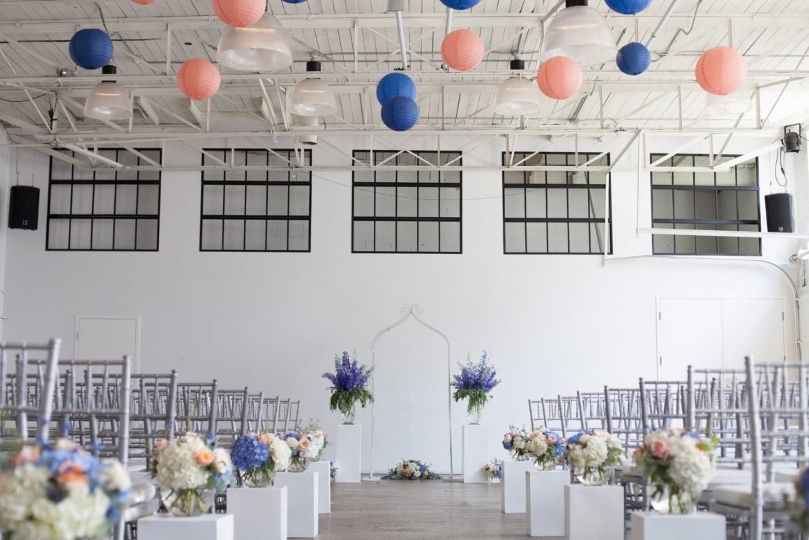 event space with tables, chairs and decor